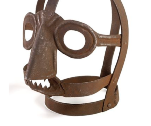 A scold's bridle or 'brank' - torture instrument, now virtually applied to those exposing social murder